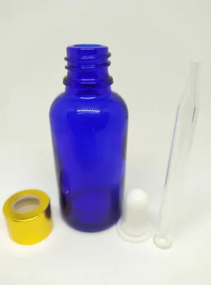 Damlalıklı mavi şişe altın kapak